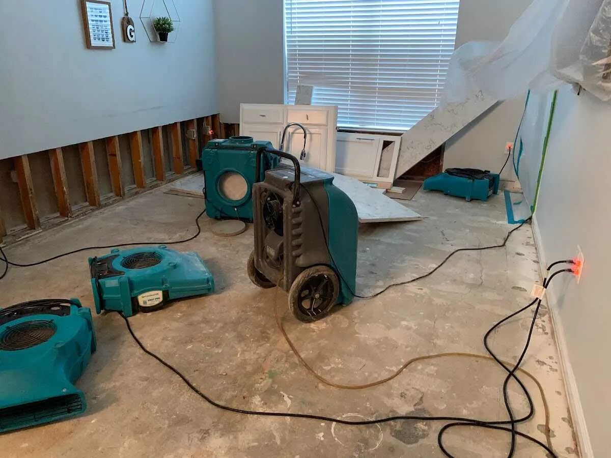 Dehumidifier in flood-cut room for Water Damage Restoration in Hingham